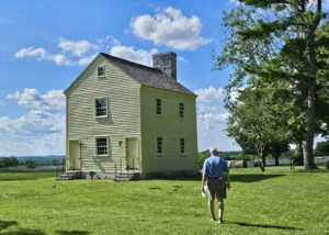 Man looks at the Old Ministry's Shop in Shaker Village, Kentucky.
